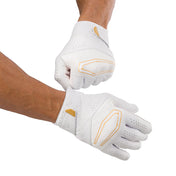 Cutters Rev X Elite Receiver Gloves - White/Gold - Football Player Pulling Glove Over Wrist for Better Fit