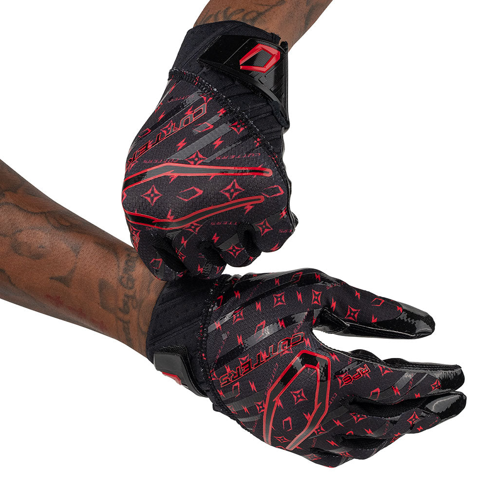 Cutters Sports Rev Pro 6.0 LE Receiver Football Gloves - Black/Red Lux - Football Player Pulling Glove Over Wrist for Better Fit