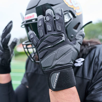 Cutters Sports Force 5.0 Black Lineman Football Gloves - Lifestyle Image 2 - Detail View of Football Player Showing  Back of Hand For Right and Left  Glove