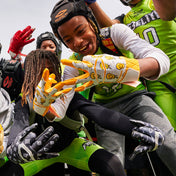 Youth 7v7 Football Player Wearing Cutters Smile Rev Pro 5.0 Limited-Edition Receiver Gloves