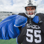 Athlete Wearing Cutters 6.0 Lineman Gloves in Blue