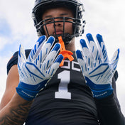 Athlete Wearing Cutters Game Day Pro Royal/White Receiver Gloves