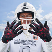 Athlete Wearing Cutters Rev Pro 6.0 Limited Edition Football Receiver Gloves in Black/Red Lux Print