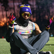 Lifestyle Image of Youth Football 7v7 Player Wearing Cutters Drip Face Rev Pro 5.0 Limited-Edition Receiver Gloves