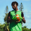 Youth 7v7 Football Athlete Wearing Cutters Sports Rev Pro 6.0 Solid Receiver Football Gloves in Shock Green
