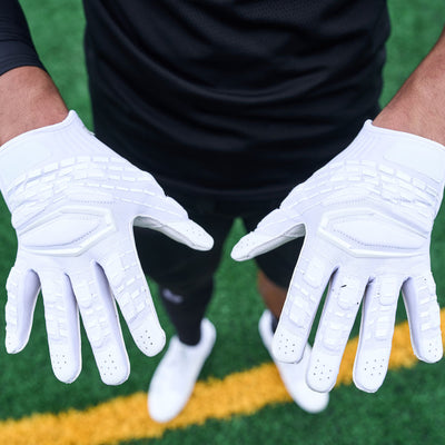 Lifestyle Detail Shot of Football Player Wearing Cutters Gamer 5.0 Padded Receiver Gloves in White