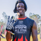 Youth Football Player Wearing Cutters Sports Checker Rev Pro 4.0 Limited Edition Receiver Gloves